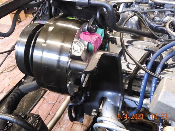 Wized off the bracket for header clearance.