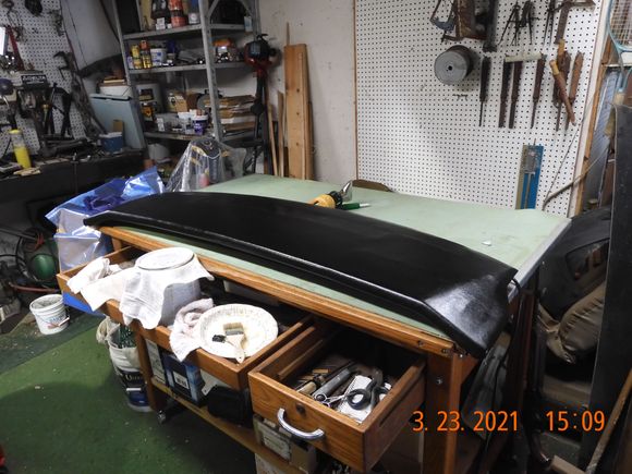 No speed bumps this time.  Gloss is from mineral spirits I used to clean off excess adhesive. Also used heat gun on those pesky corners and eliminated folds. Happy with results.