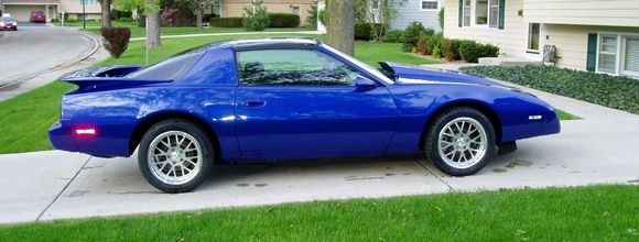 Corvette Admiral Blue, Harwood cowl hood, 91 Formula bumpers, flush doorhandles, 4th gen wing, C4 brakes, Boze forged wheels.  Done.