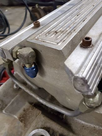 Blue block off cap Driver Side