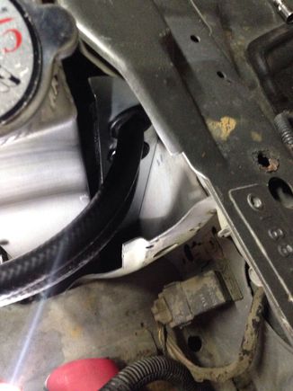The next 2 pictures are the plates I made to seal the radiator so air goes through instead of around. Those hoses go to the trans cooler in front of the radiator.