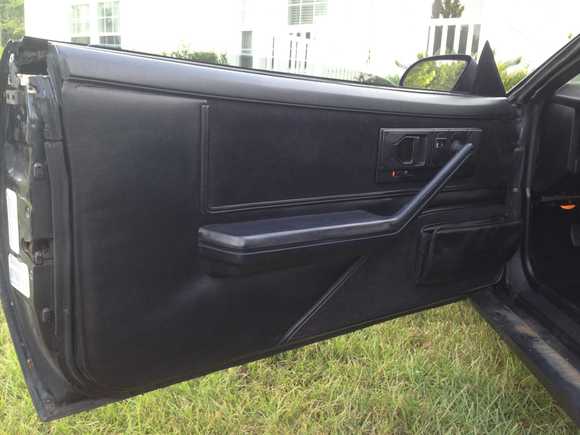 I used fabric interior paint and painted all the plastics and carpet in this car black 2 years ago, these door skins have held up very well to this day so they will stay