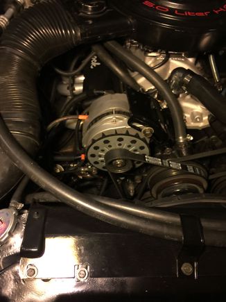 Stock brackets and still bolted to the intake manifold.The larger adjusting bolt fits and makes the install move OE than some conversions I saw on the internet