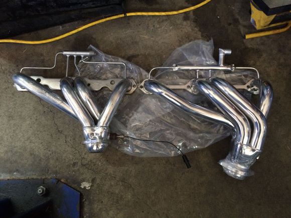 Driver side header comparison.  Notice how much lower the collector is on Don's and that it faces the front of the car.