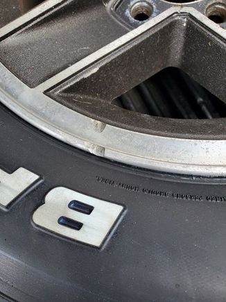 Damaged I noticed after getting the old tire removed. That's a couple of notches.