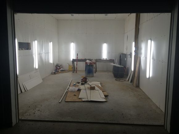 12 LED lights, 9000cfm fan, piped in air with desiccant filtration, added a wall with entry door/ sight window