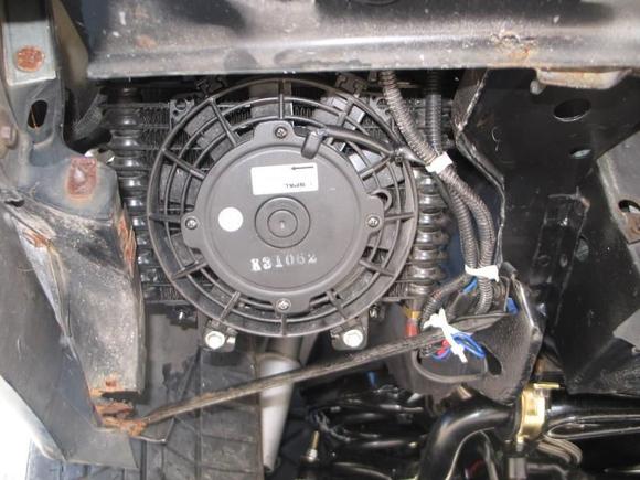 transmission cooling fan mounted under battery box