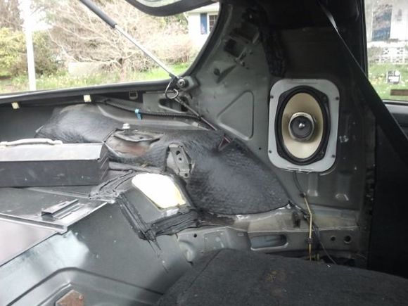 Rear seats and sail panel removed.