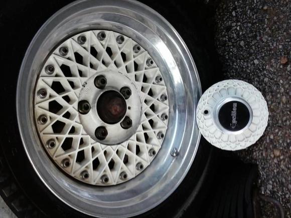 Currently outfitted with Epsilon three piece mesh wheels (unfortunately I cannot fit 14" rotors &amp; 6 piston calipers inside these....so, they gotta GO! )