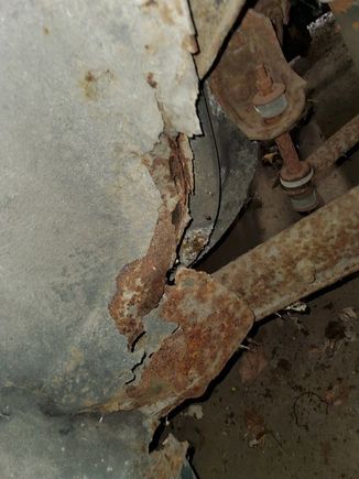 Driver side wheel well rusted area
