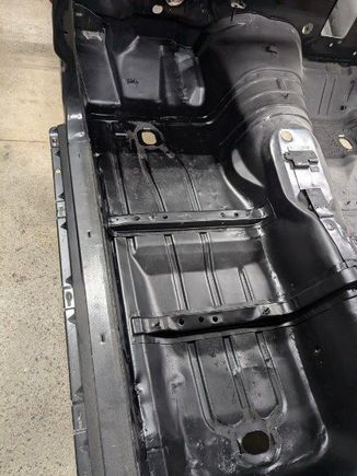 Clean floor.  Couple small dents that won't take much to level out.