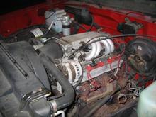 The dormant beast. The block is original to the truck, but everything else is different. From my uncle who helped build the engine I know it was bored over .30 to make it a 383, has Eagle Specialty Products forged stroker rotating assembly (H-beam rods, flat pistons), hydraulic roller lifters, moly push rods, trick flow aulm. heads, roller rockers, comp cams camshaft (.5-.51 lift 288 dur.), stiffer springs, high flow oil pump, edelbrock performer seires valve covers, 36lb injectors, and more I just don't know about. It powers a built up 700R4 trans to a 10 bolt chevy rear-end. It used to have a B&amp;M 144 Blower on it, but my dad must have put the TPI back on.