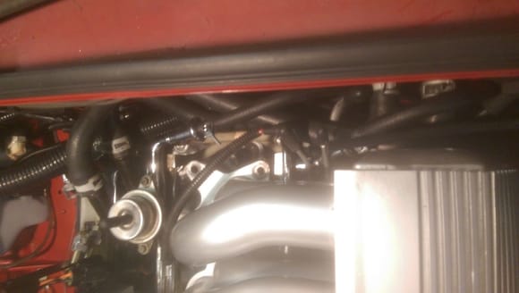 Fuel line and heater hoses installed