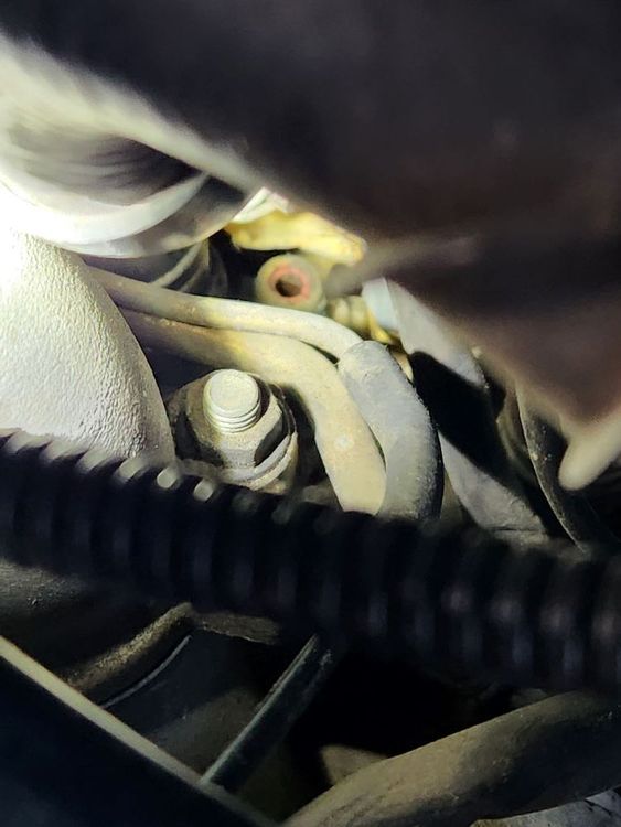 This sends a signal to the coolant temperature gauge inside the truck. I need a part number. As you can see the top has been broken off. The plug is wasted also. So I need both part numbers. Or tell me where it is in the service manual. Thanks,