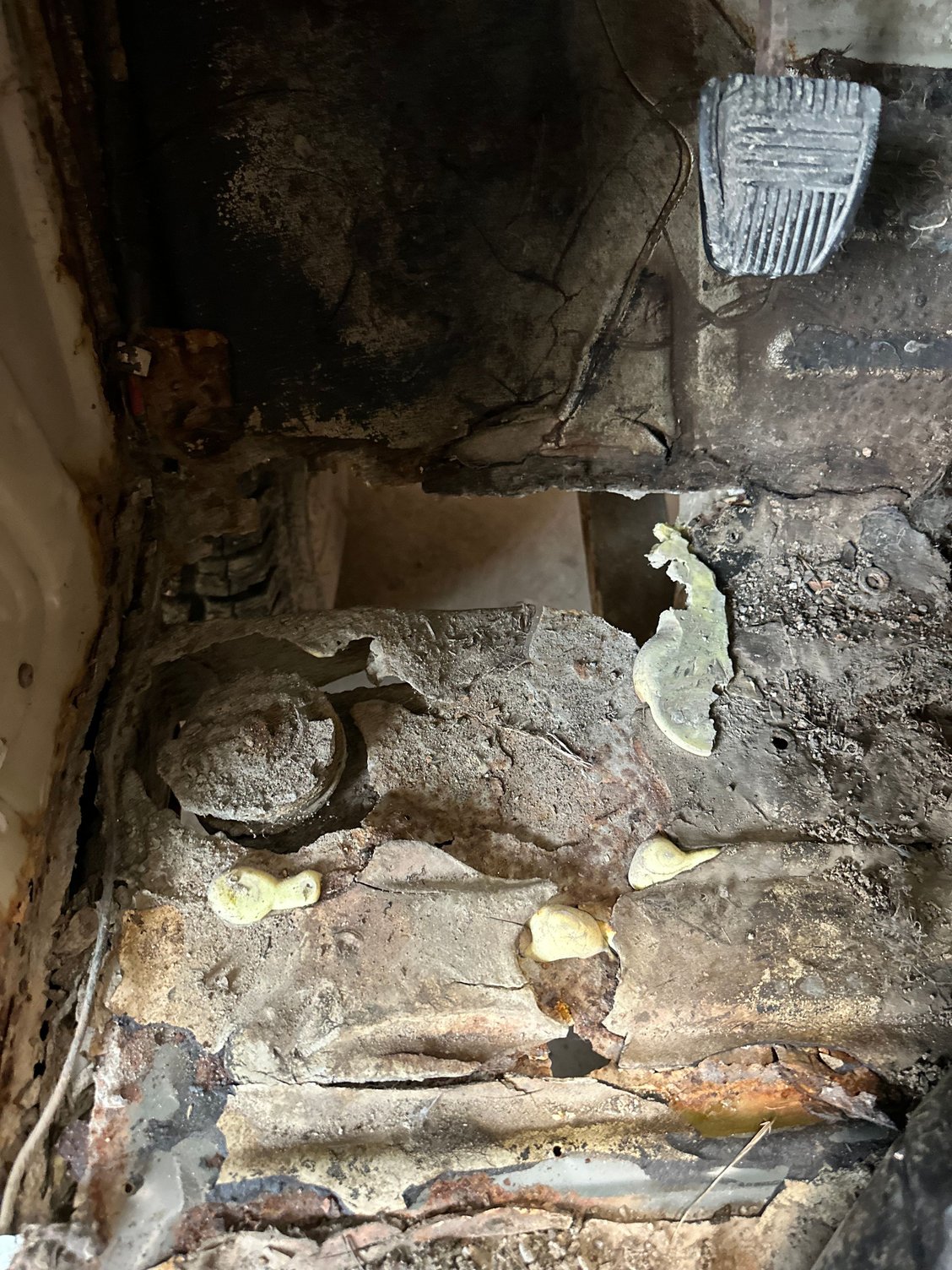 Rotten floor and cab mount underneath.  Frame mount is good. 