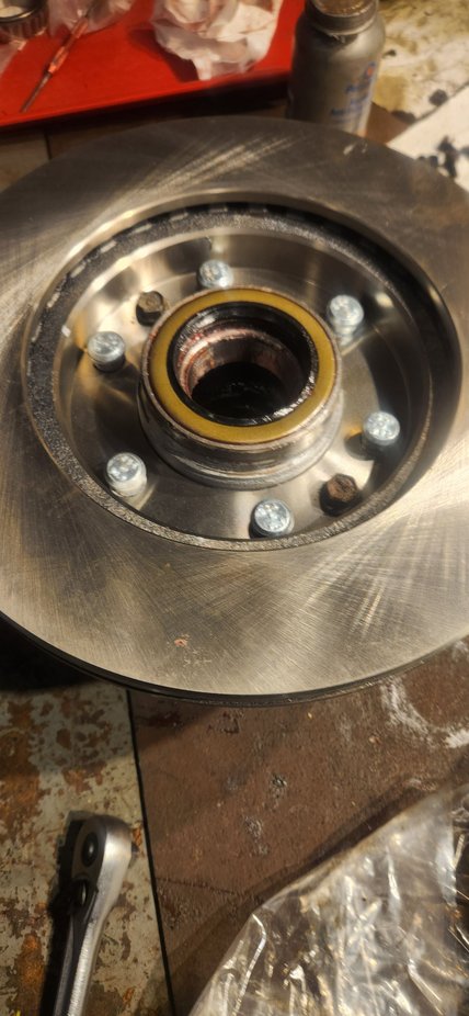 Wheel studs got a anti seize around the whole thing, grease would work too. This mainly for a lubrication as they set into place. Got them started with light hits with hammer and punch.