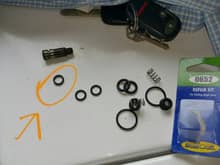 I've gone head and replaced the old O-Ring in the idle screw. I ended up just eyeing it from this parts repair kit from Lowes.
