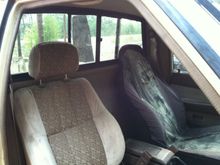 sr5 seats! But the driver's side has zero cushion left.  I'm sitting on the rail.  Maybe junkyard yota seats in the future. Center console hinge is busted and the top is pretty nasty. Read window works about as well as you'd expect for this age.