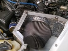 Made my K&N 57-9006 to be an actual CAI by shrouding the air filter.