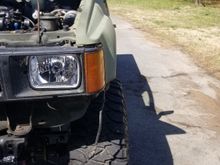 Rolled the Runner outside to get a look at it and immediately noticed something was off. The passenger side tire was sticking past the fender by 1 inch more then the driver and was like wtf is going on now lol.