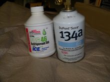 Also with the 134 charge you must use the correct oil compatible with the compressor and the 134.  
The compressor came shipped with oil which I drained and flushed out with the PAG46 Then I used a digital postal scale to get the correct amount of oil  by weight into the compressor following the FSM for a new system with every component replaced . The amount of oil will vary depending on what is replaced in the system, so follow the FSM.