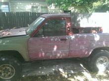 snagged that gorgeous army green fender from the junk yard for $20 - had been hit on the right front and the old fender was garbage