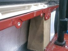 Front side of the box.  I actually unhooked the rear tail light wiring and ran it on the inside of the side panel and metal supports to bypass the box (unlike the factory on the outside of the metal supports)
