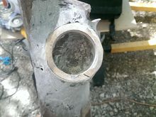 after a smoke break, it was set up and hardened, so I used my favorite tool in the world, a 5" angle grinder and flap wheel to quickly sand down and smooth out the filler