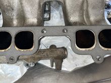 Plenum to intake manifold, top bolt holes aligned and bottom not