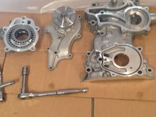 Oil pump, water pump, and timing cover laid out