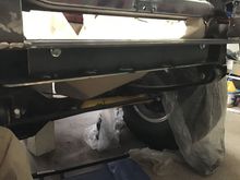 View from the front with top two bolts installed in bracket. 