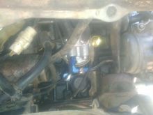 Somewhere in there is the knock sensor, and I'm assuming it's visible but not sure in the thumbnail..