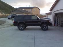 Updated Photo : Added 2" lift coils from Old Man Emu and a 1 1/2" Daystar Spacer for a whopping 3 1/2"  Now were ridin level!