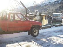 There's probably better ways to hoist a rig, but a 4-point to the rims worked fine, give or take some dents in the fenders
