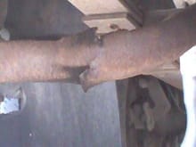 old rusty tailpipe