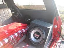 the Optima Yellow-Top is behind that third-row seat.  The 750W mono amplifier for the 10's is underneath the third-row seat.  The 1200W mono amp for the 8's is under the driver's seat.  The 4-channel bridgeable 4x100W amp is under the passenger seat.