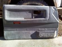 Speaker would sit somewhere below door reflecor (basically at lap height while sitting in seat).