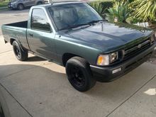 Paint is aftermarket dark forest green with slight metalflake