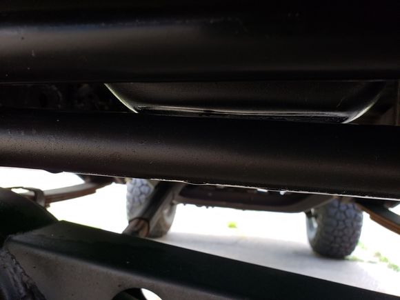 Steering rod self clearancing oil pan