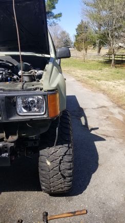 Rolled the Runner outside to get a look at it and immediately noticed something was off. The passenger side tire was sticking past the fender by 1 inch more then the driver and was like wtf is going on now lol.