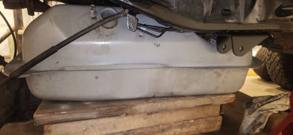 With the lines hooked up and the new fuel line anti seized and tight on both ends. Before bolting the tank all the way up i started the truck and let it idle for a few mins to make sure no leaks existed.