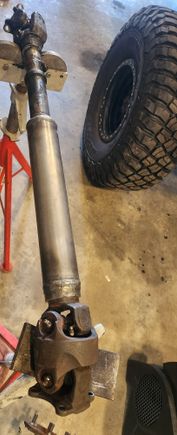 I dorpped the driveshaft off last week to have it extended. Couple days later they had it done and picked it up after work.
I did not write down original length but i believe it was lengthened 3.5". This one i measured flange to flange and told them i wanted 33.375". I took just a little off the actual measurement to account for the minute amount of leaf spring settling.