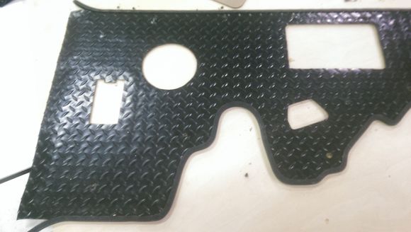 hole for the rear 6 1/2" speaker and the crazy jog on the passenger's side to accommodate the fuel neck hump.