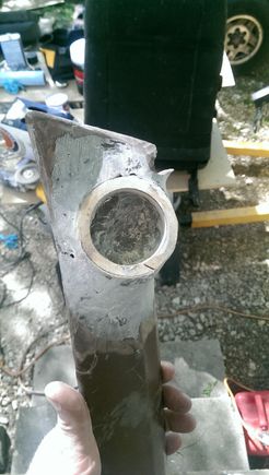 after a smoke break, it was set up and hardened, so I used my favorite tool in the world, a 5" angle grinder and flap wheel to quickly sand down and smooth out the filler