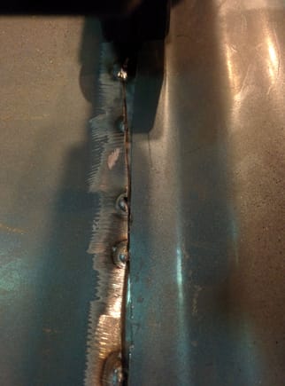 This is how i fixed the gap. I cut a 2" strip off the scrap piece and welded it in behind the seam. You can see it through the gap in the bed. I filled the seam in with weld and now i think it's the strongest part of the bed. I hope it won't trap moisture though.