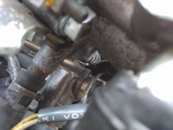 Air valve, rear hose to intake bypass. Fuelrail end cap is the shiney peice, just above this is bypass hose #2 forward outlet.