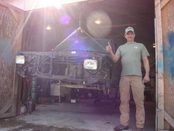 Casey giving the "thumbs up". Ready to roll the frame under the body.