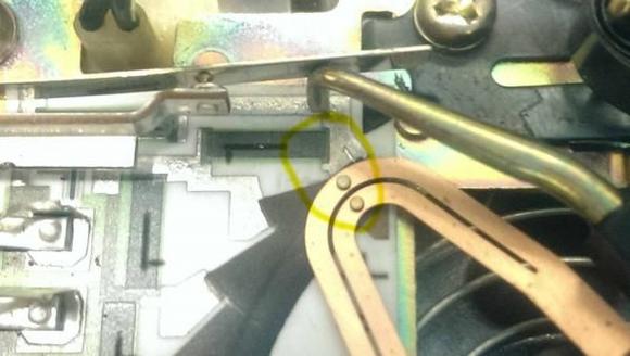 Marking the original position of the 22RE sensor to be able to adjust it slightly forward to "richen" up the mixture to account for the increase in airflow