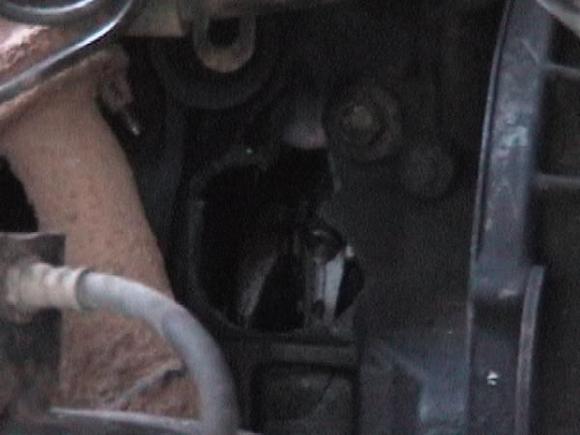 If you look close the bracing on the block below the hole is cracked also.