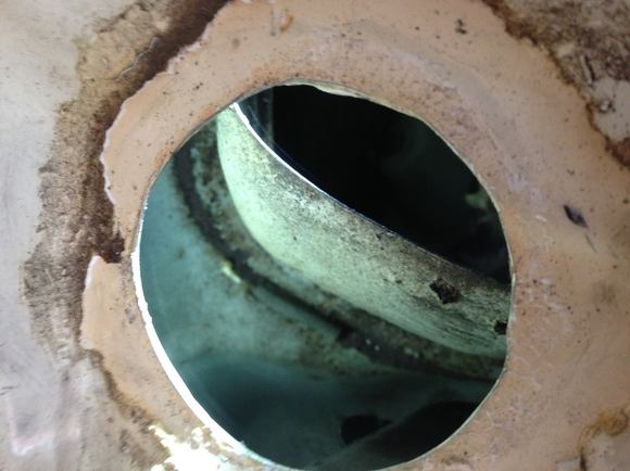 Looking down the hole, you can see the box that keeps water out of the fresh air intake